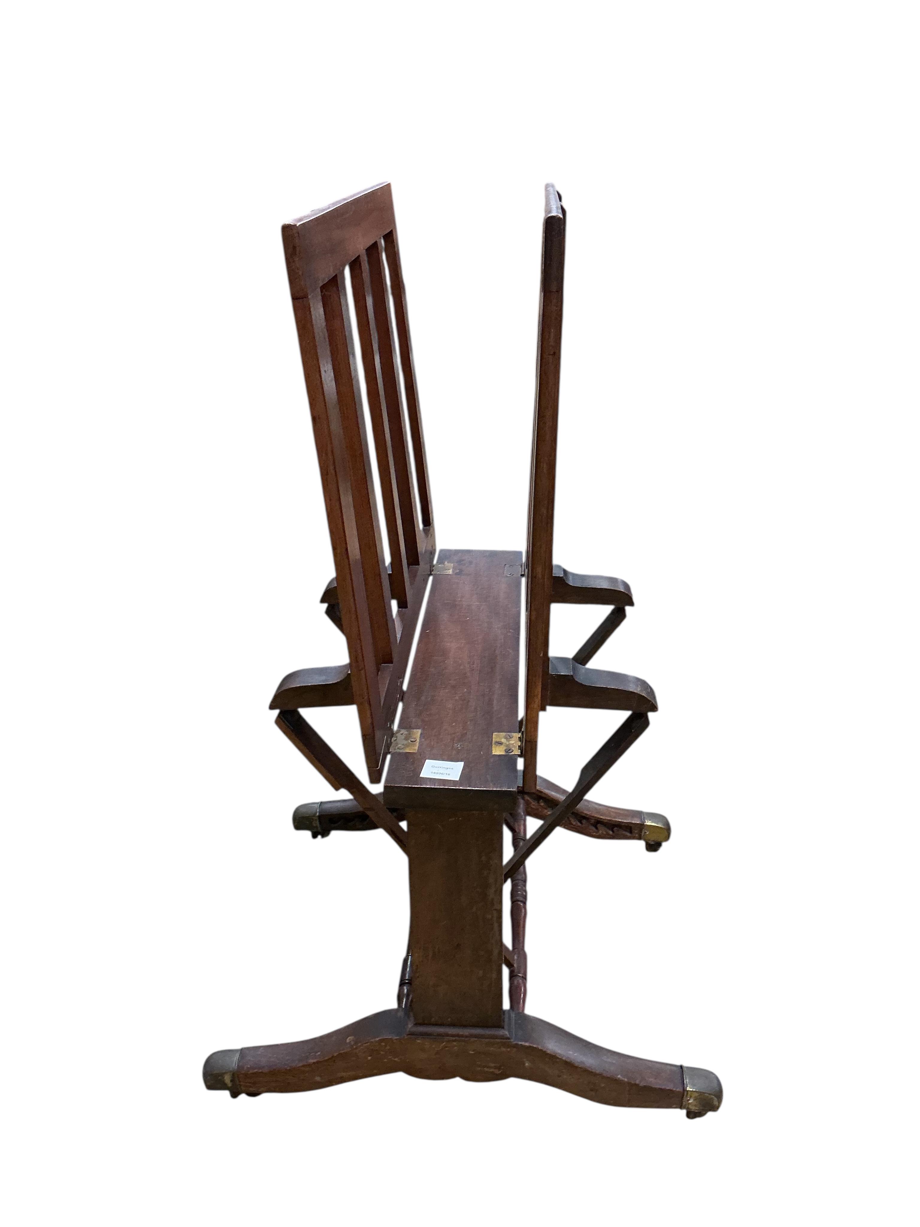 A Victorian mahogany folio stand, with adjustable sides united by turned stretchers, width 66cm, height 106cm